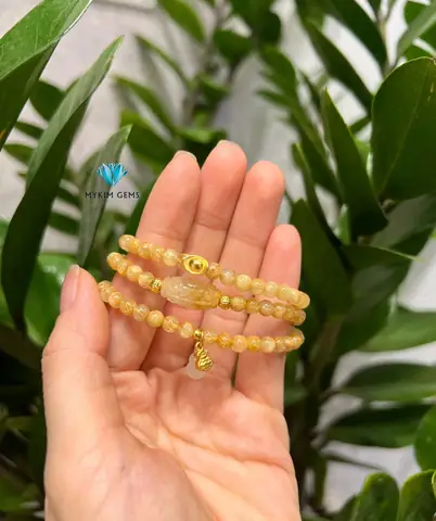 Vòng Tay Thạch Anh Tóc Vàng Mix Charm: Ý Nghĩa, Cách Chọn & Địa Chỉ Mua Uy Tín